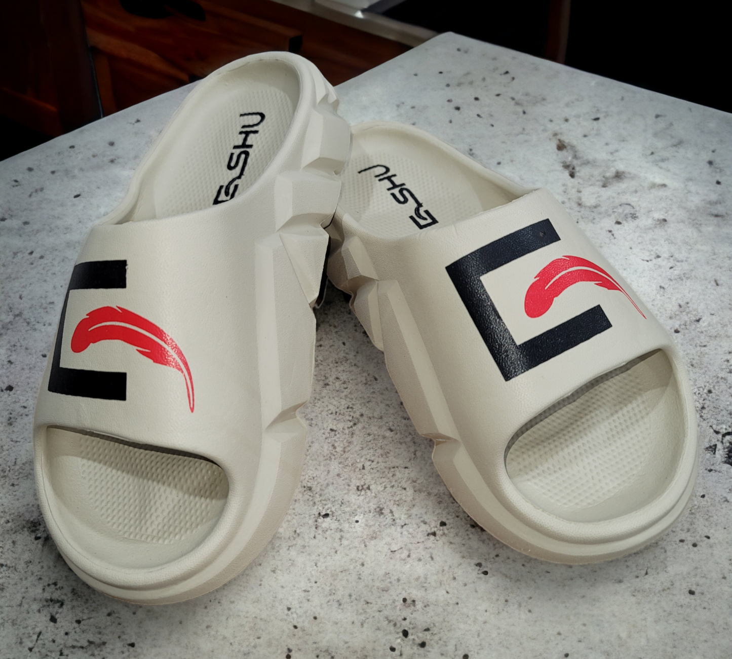 Eshu Apparel Ezzy Slides: Your Summer Fashion Statement